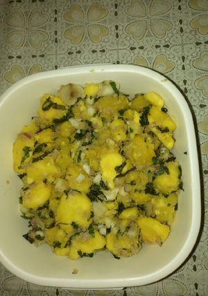 A picture of Sweet potatoes with mint leaves.