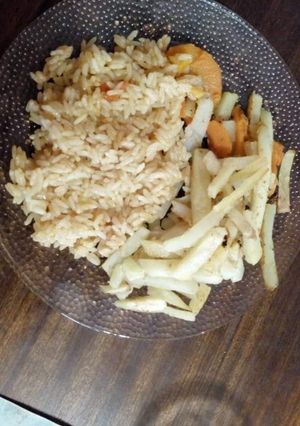 Una foto de Arroz frito con papas y zapallo al horno