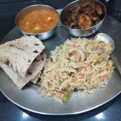 Pea curry Pulao Karela and chapati A picture of Pea curry Pulao Karela and chapati.