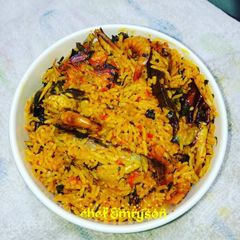 A picture of Palm oil rice.