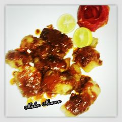 A picture of Fish fry with sauce.