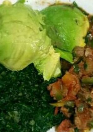 A picture of Beef Stew and Sauteed kales.