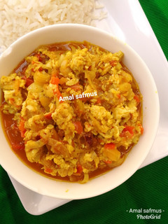 A picture of Simple egg sauce and white rice.