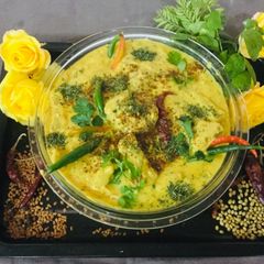 A picture of Punjabi Kadhi Pakoras.