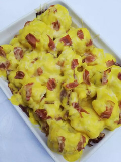 Una foto de Coliflor al horno con cúrcuma y bacon