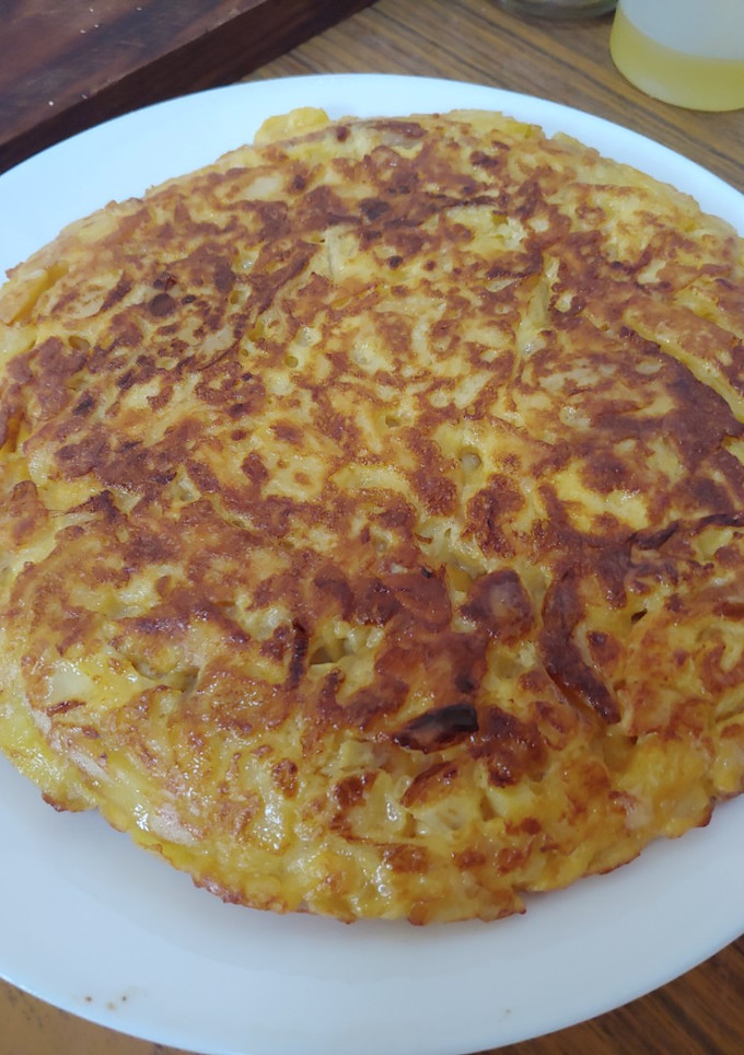Una foto de Tortillas de Patatas cebolla y 🐙 pulpo
