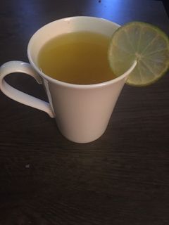 A picture of Honey Turmeric tea w/ lime.