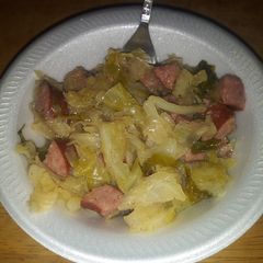 A picture of Polish Sausage and Cabbage.