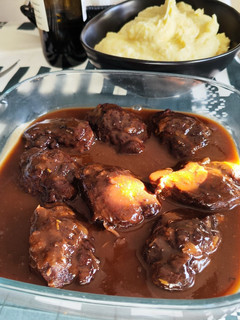 A picture of Pork Cheeks in Wine.