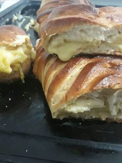 Una foto de Trenza de brioche rellena de crema pastelera😍 Un amor