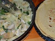 Una foto de garbanzo con pollo al curry