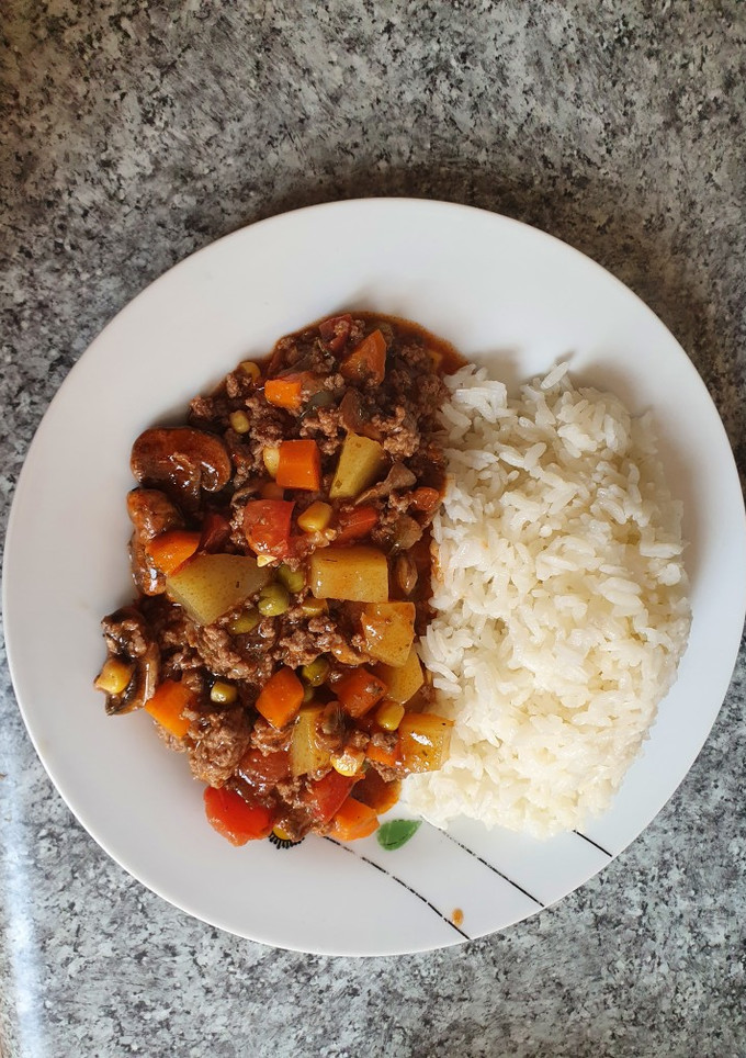 Una foto de Charquicán con champiñones.