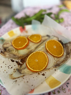 Una foto de Dorada con naranja en airfryer