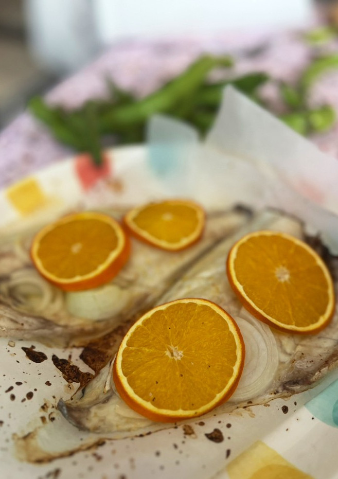 Una foto de Dorada con naranja en airfryer