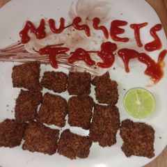 A picture of Delicious chicken nuggets.