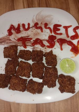 A picture of Delicious chicken nuggets.