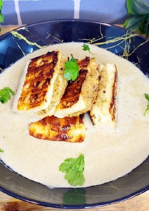 A picture of Stuffed Paneer Pasanda In White Gravy.