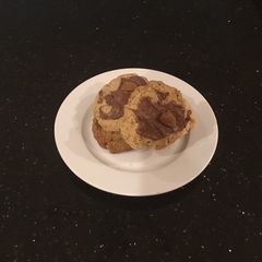 A picture of Milk Chocolate Glazed Pistachio Shortbread Cookies.