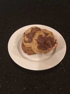 A picture of Milk Chocolate Glazed Pistachio Shortbread Cookies.