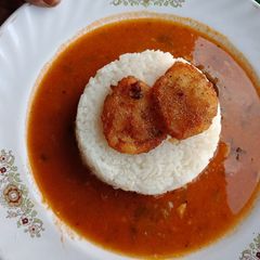 Curry Chawal with Aloo Fry A picture of Curry Chawal with Aloo Fry.