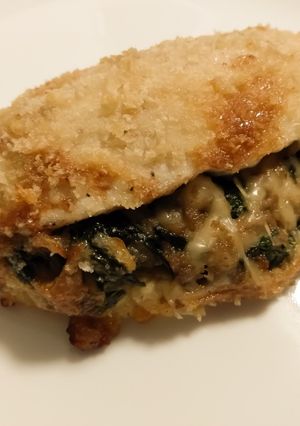A picture of Chicken breasts stuffed with spinach and emmental.