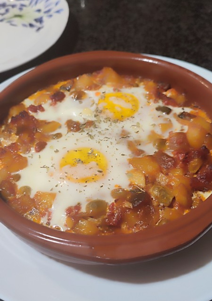Una foto de 🍳Huevos a la flamenca con chorizo y habitas baby 👌