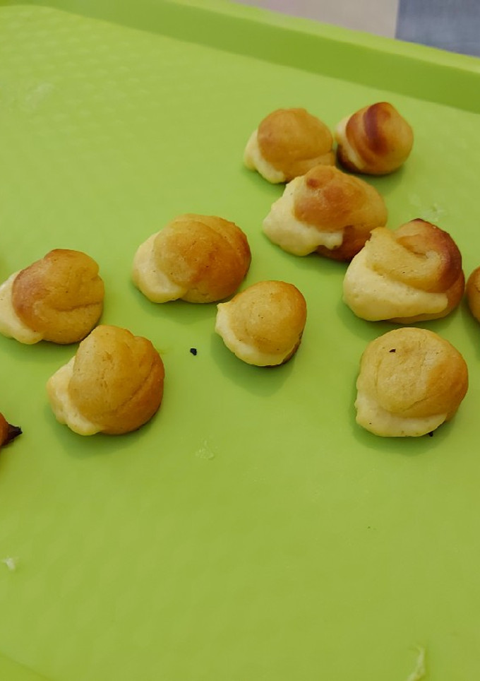 Una foto de Profiteroles de crema pastelera