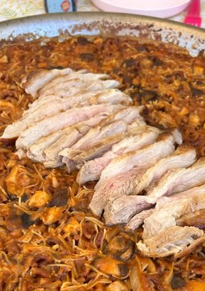 A picture of Fideuá with Pork Secreto and Mushrooms.