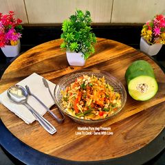 Green Raw Papaya Peanuts Zesty Crunchy Salad A picture of Green Raw Papaya Peanuts Zesty Crunchy Salad.