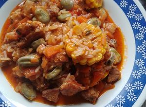 Una foto de Guiso de arroz con habas y choclo