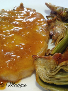 Una foto de Chuletas de cerdo en salsa de vino y limón