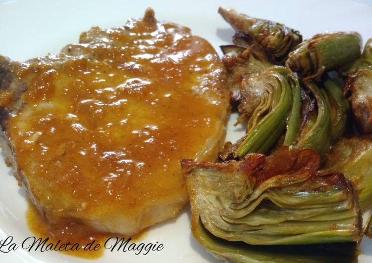 Chuletas de cerdo en salsa de vino y limón
