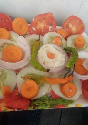 A picture of Mix veggies salad with mayonnaise.