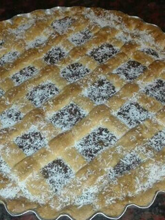 Una foto de Pasta frola de batata c/chocolate y dulce de leche