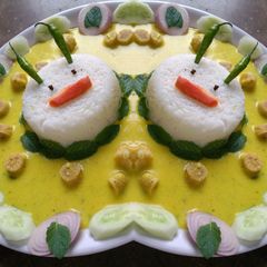 A picture of Gatte ki kadi with rice.