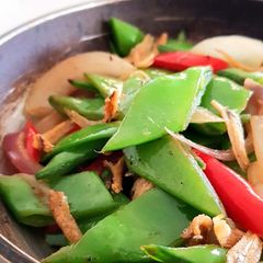 Snow Peas with Caramelized Onions and Crispy Anchovies A picture of Snow Peas with Caramelized Onions and Crispy Anchovies.