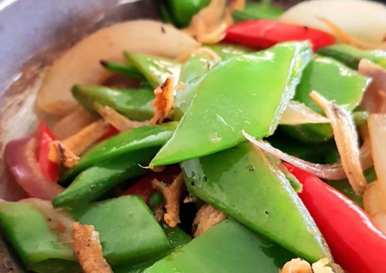 Snow Peas with Caramelized Onions and Crispy Anchovies