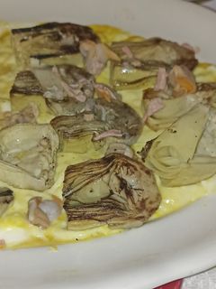 Una foto de Alcachofas con crema de cítricos