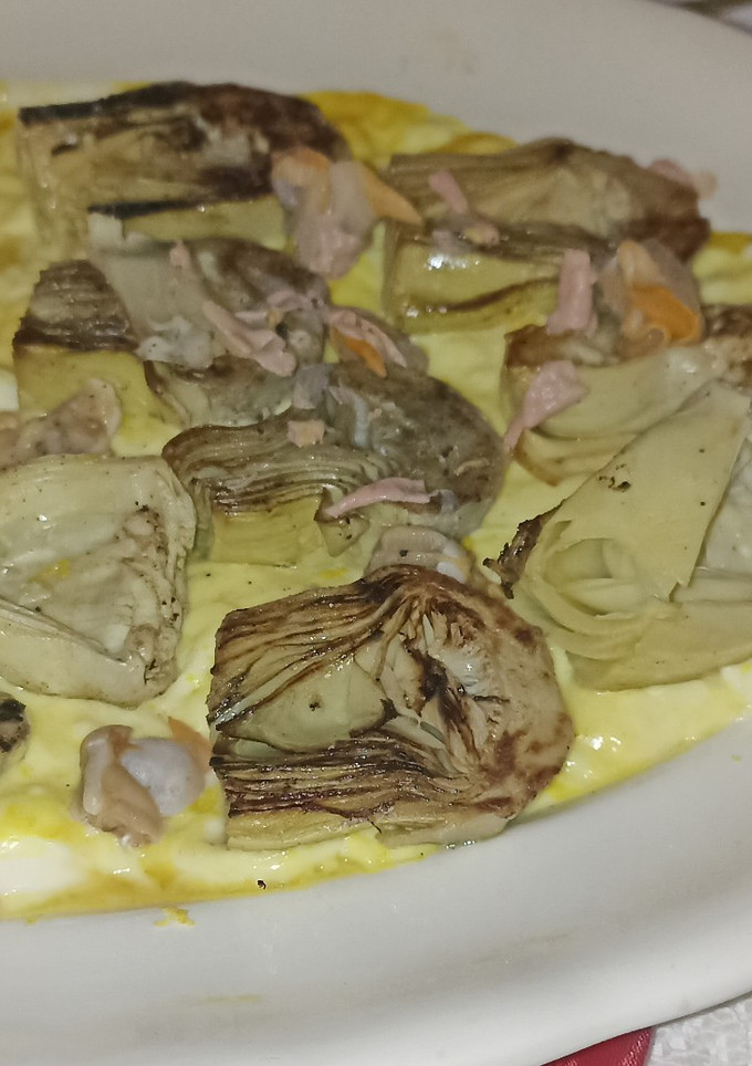 Una foto de Alcachofas con crema de cítricos
