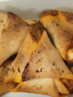 Una foto de Triángulos de atún al horno