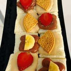 A picture of Eat milk bread with fruit and biscuit.