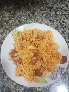 Una foto de Paella de pollo y chistorra