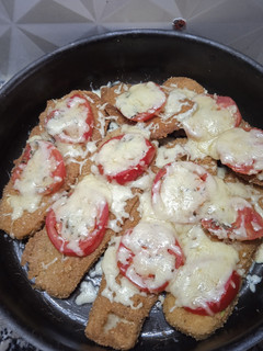 Una foto de Milanesas de zucchini a la napolitana