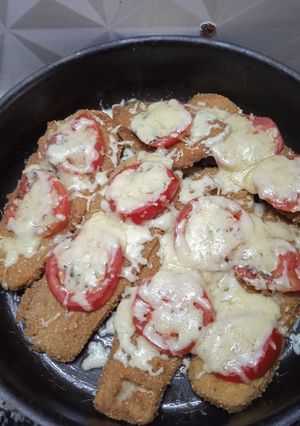 Una foto de Milanesas de zucchini a la napolitana