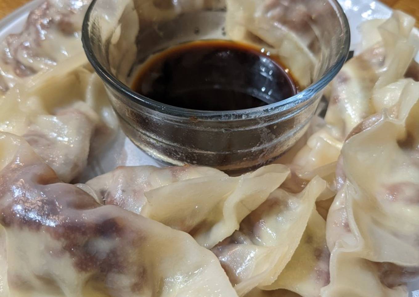 Chinese dumplings with cheesy corned beef