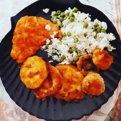 A picture of Fried Veggies and Meat With Green Pea Rice.