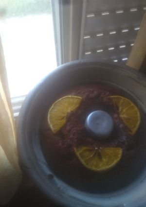 Una foto de Bizcochuelo de chocolate y 🍊 vegano con pocos ingredientes
