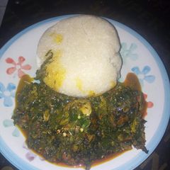 A picture of Vegetable and garri swallow.