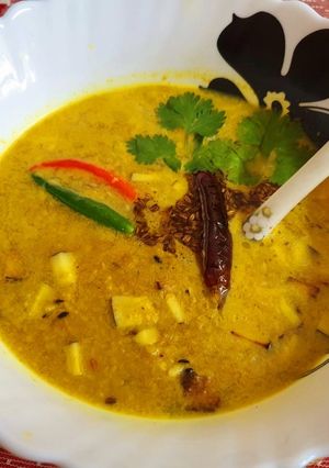 A picture of Traditional Bengali Narkol Diye Bhaja Moong Dal.