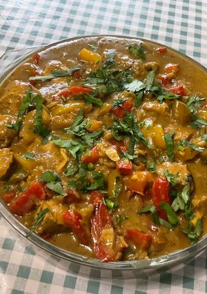 Une photo de Poulet au lait de coco et poivrons
